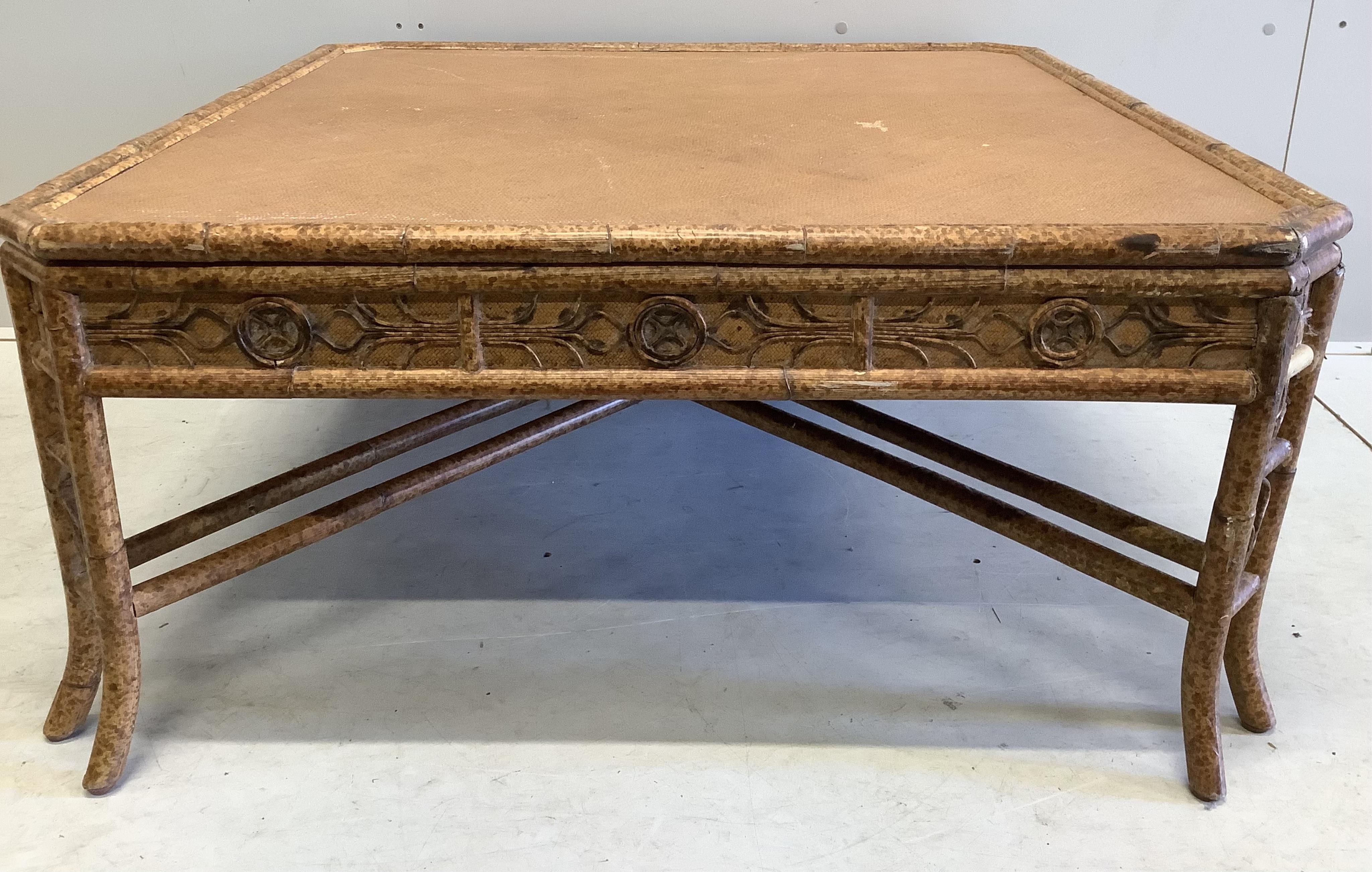 A square bamboo and rattan coffee table, width 94cm, height 44cm. Condition - fair